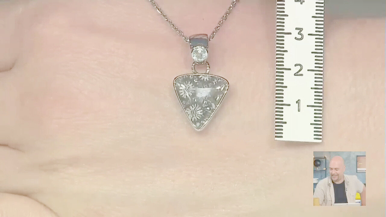 Video Ciondolo in argento con Corallo Pietrificato (Bali Barong)