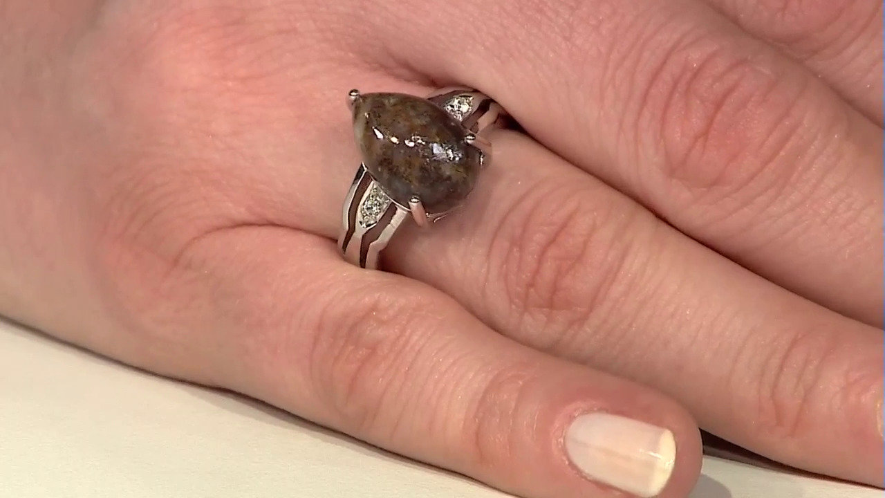 Video Zilveren ring met een dinosaurus kwarts