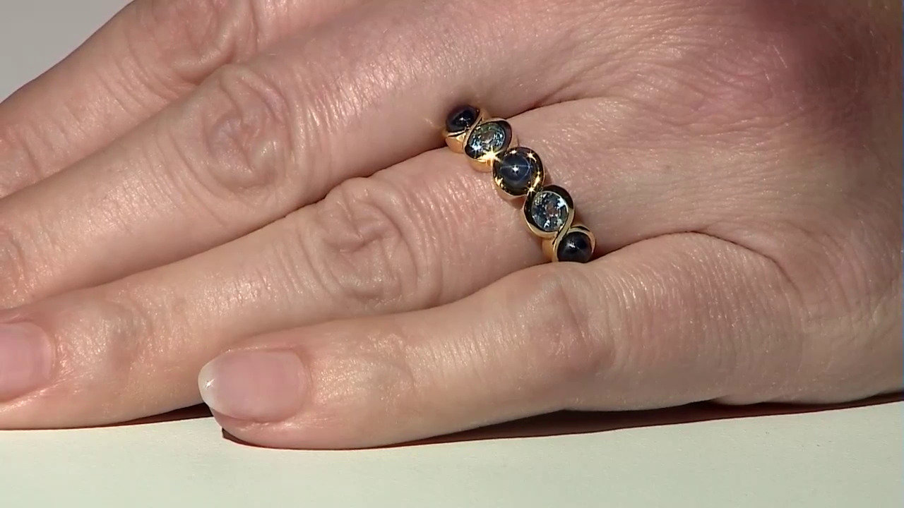 Video Zilveren ring met blauwe ster saffieren