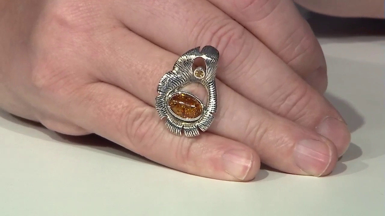 Video Zilveren ring met een barnsteen