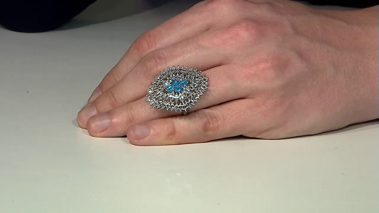 Video Zilveren ring met hemel-blauwe topaasstenen