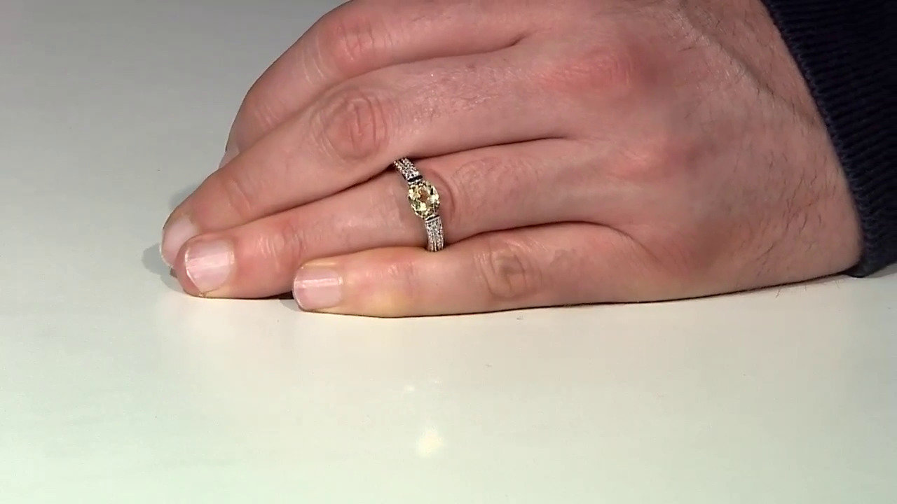 Video Zilveren ring met een kanariegele kunziet