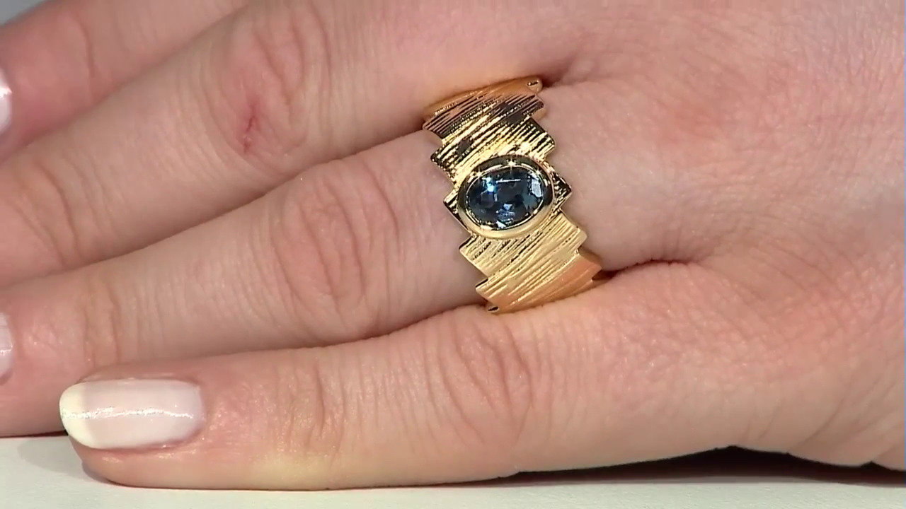 Video Zilveren ring met een Londen-blauwe topaas (de Melo)