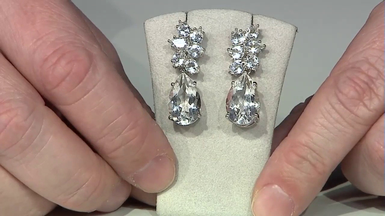 Video Zilveren oorbellen met witte kwartskristallen