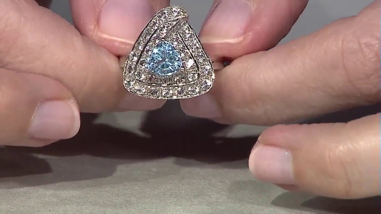 Video Zilveren ring met een hemel-blauwe topaas