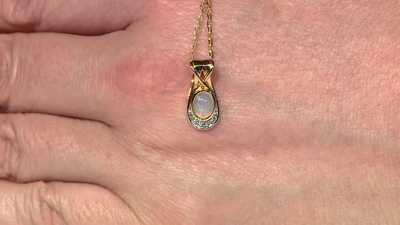 Video Zilveren hanger met een Welo-opaal