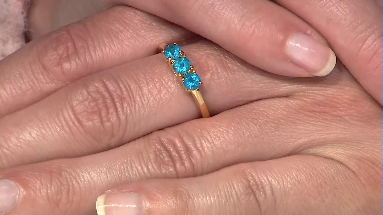 Video Zilveren ring met neon blauwe apatieten