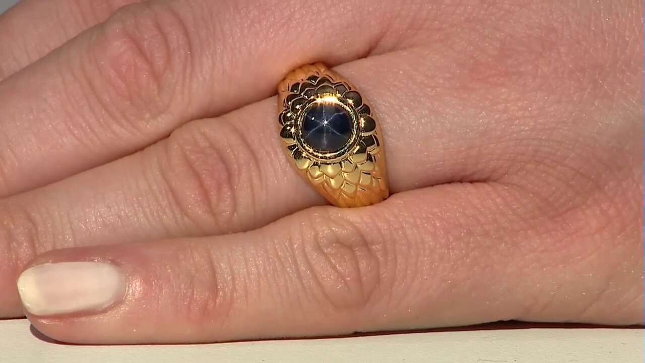 Video Zilveren ring met een blauwe ster saffier