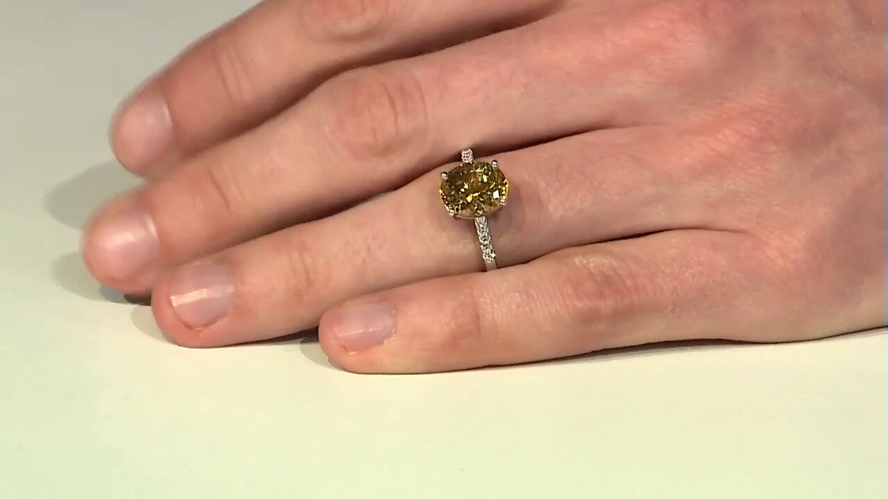 Video Zilveren ring met een Gouden apatiet