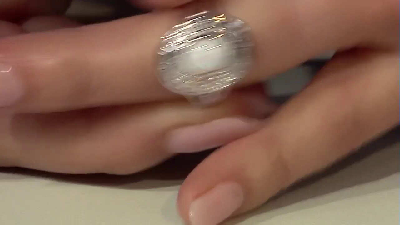 Video Zilveren ring met een witte opaal