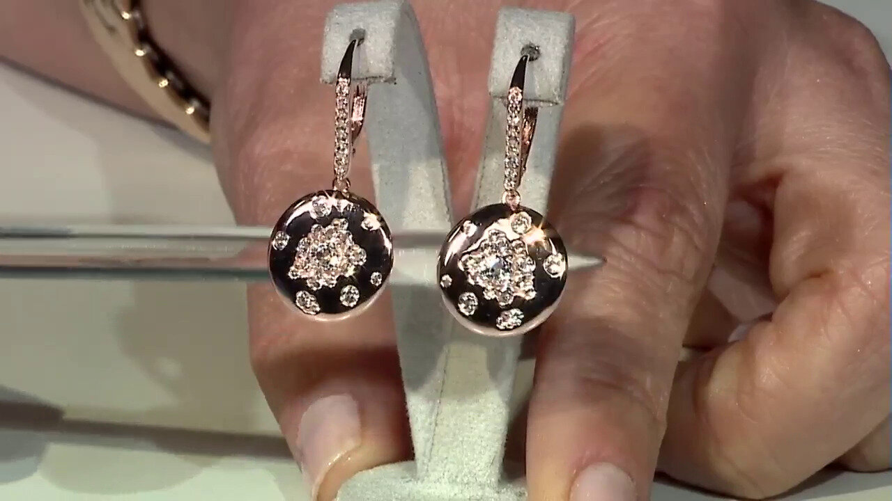 Video Pendientes en plata con Topacio blanco (Adela Silber)