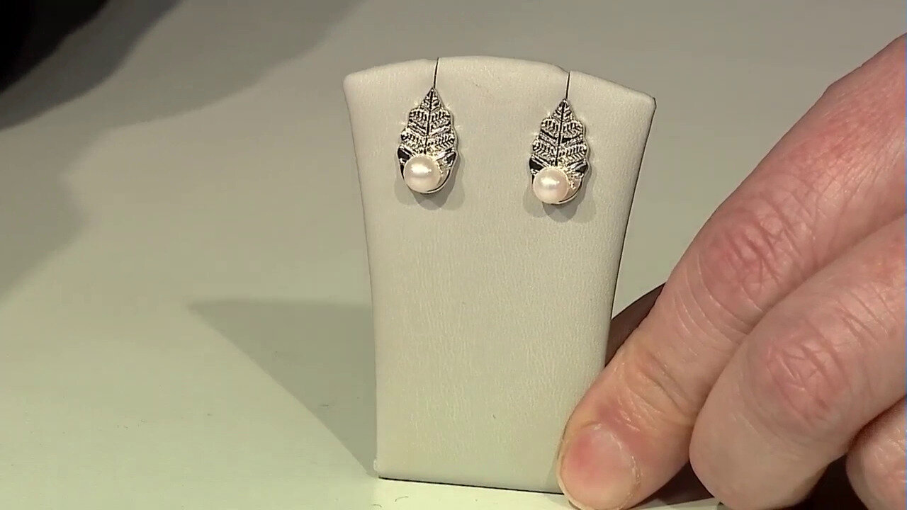 Video Zilveren oorbellen met zoetwater kweekparels