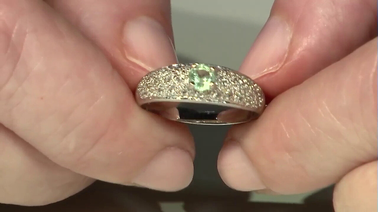Video Zilveren ring met een Munt Kyaniet