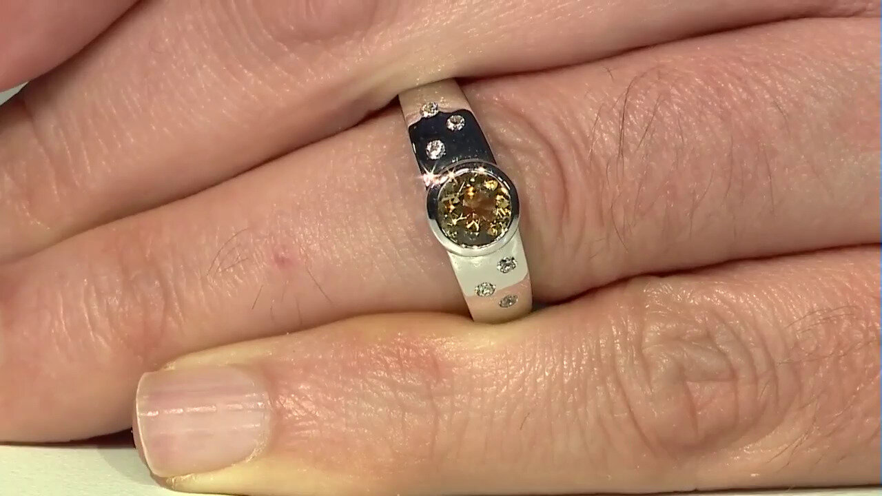Video Gouden ring met een gele beril