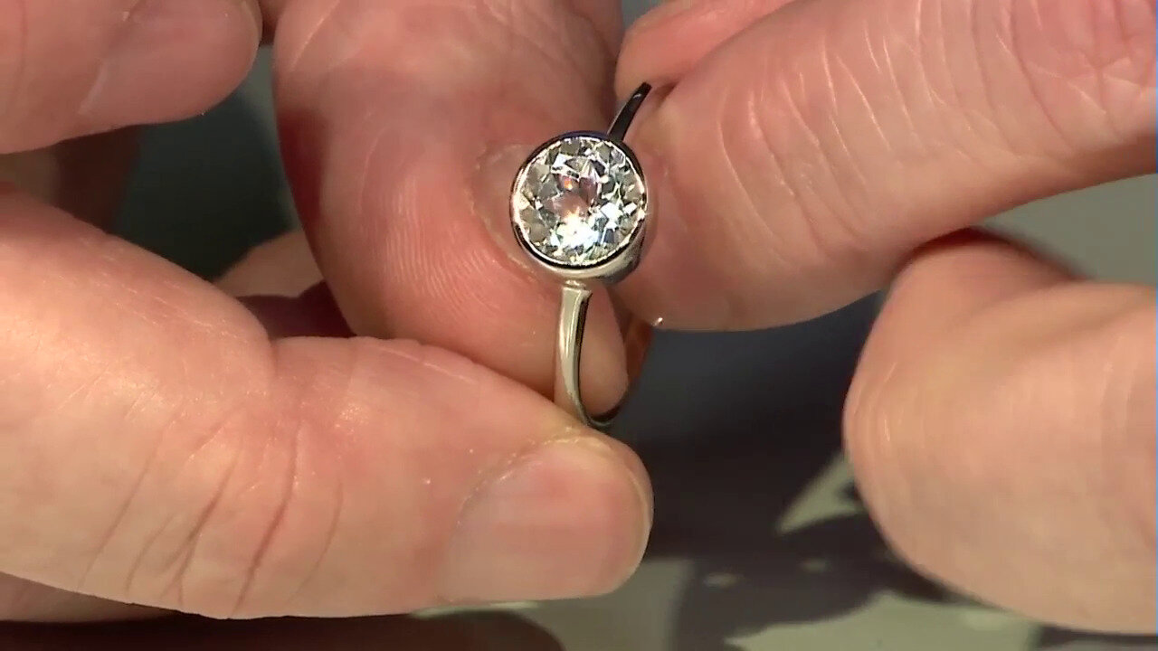 Video Zilveren ring met een witte topaas