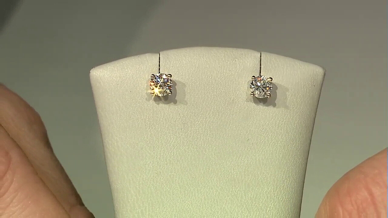Video Gouden oorbellen met I1 (H) Diamanten (CIRARI)