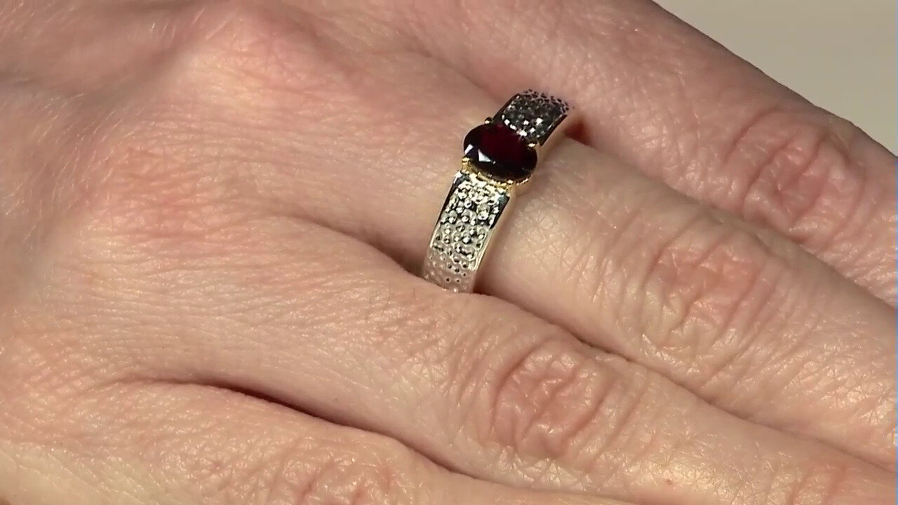 Video Zilveren ring met een framboos rhodoliet