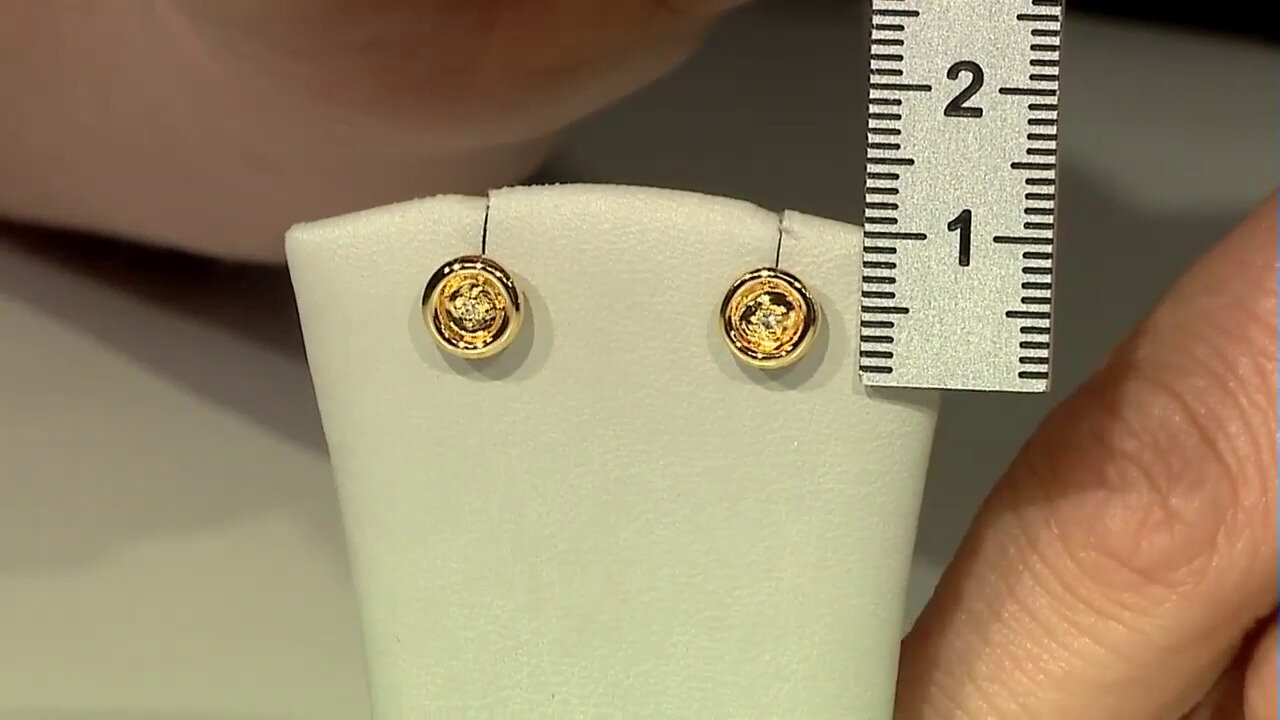 Video Zilveren oorbellen met SI2 (J) Diamanten