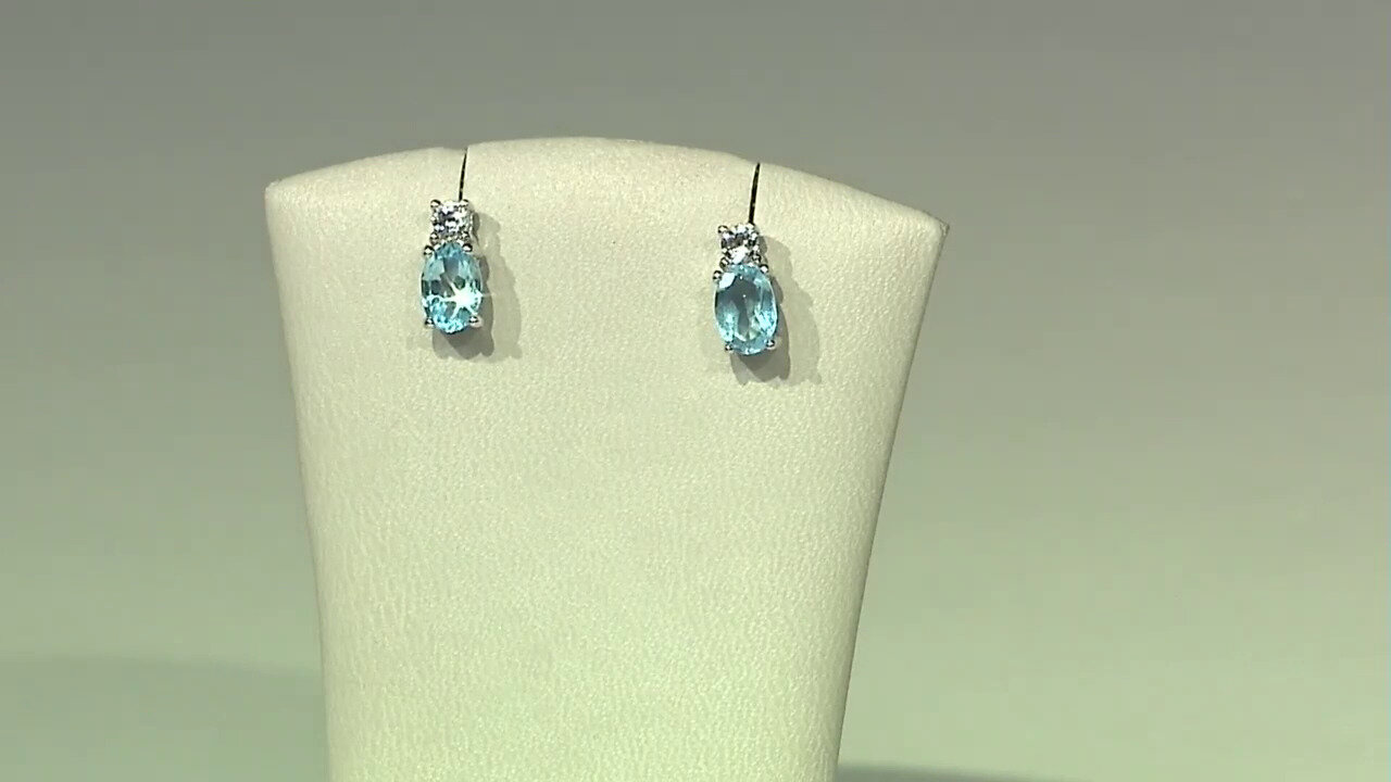 Video Zilveren oorbellen met Zwitsers-blauwe topaasstenen
