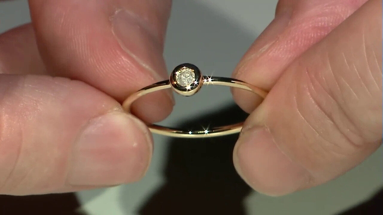 Video Gouden ring met een I3 (J) Diamant