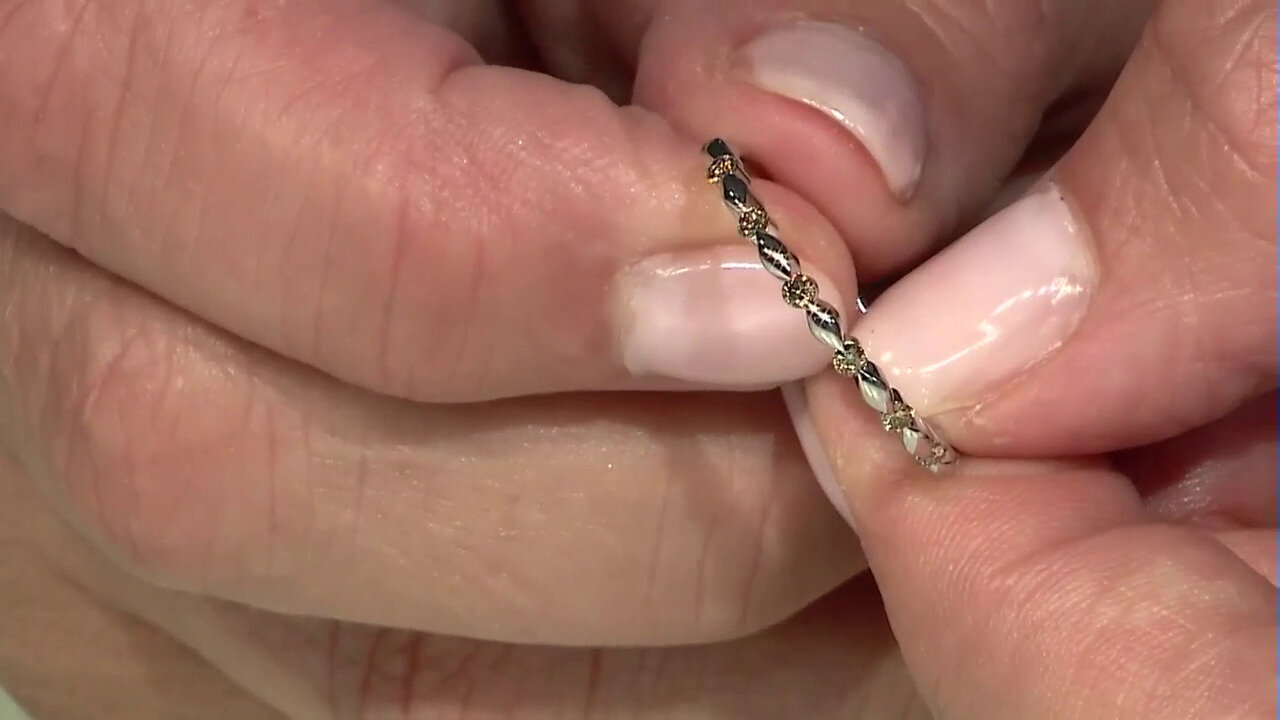 Video Platina ring met SI2 Bruine Diamanten
