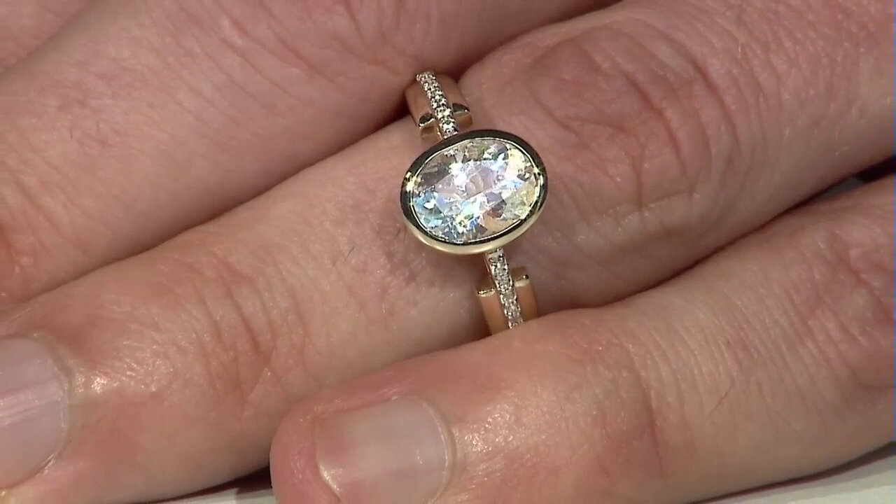 Video Gouden ring met een AAA regenboog-maansteen (Mark Kaufman)
