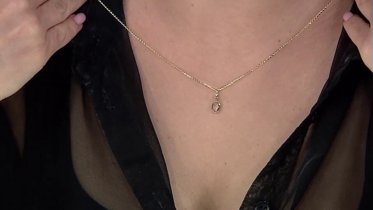 Video 9K White Topaz Gold Pendant