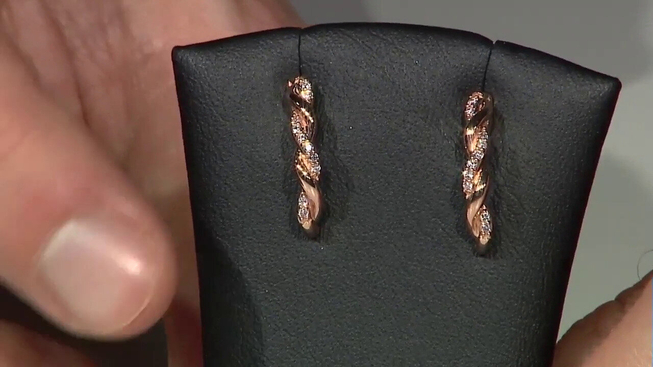 Video Gouden oorbellen met I3 Argyle Diamanten (Mark Tremonti)
