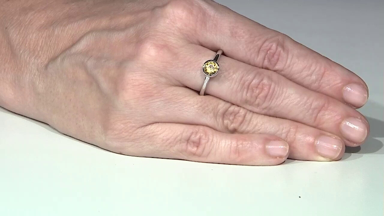 Video Zilveren ring met een gele beril