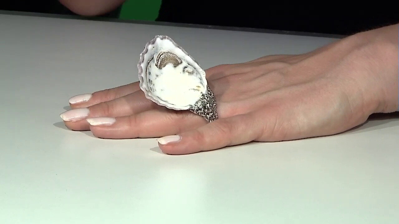 Video Zilveren ring met een schelp (TPC)
