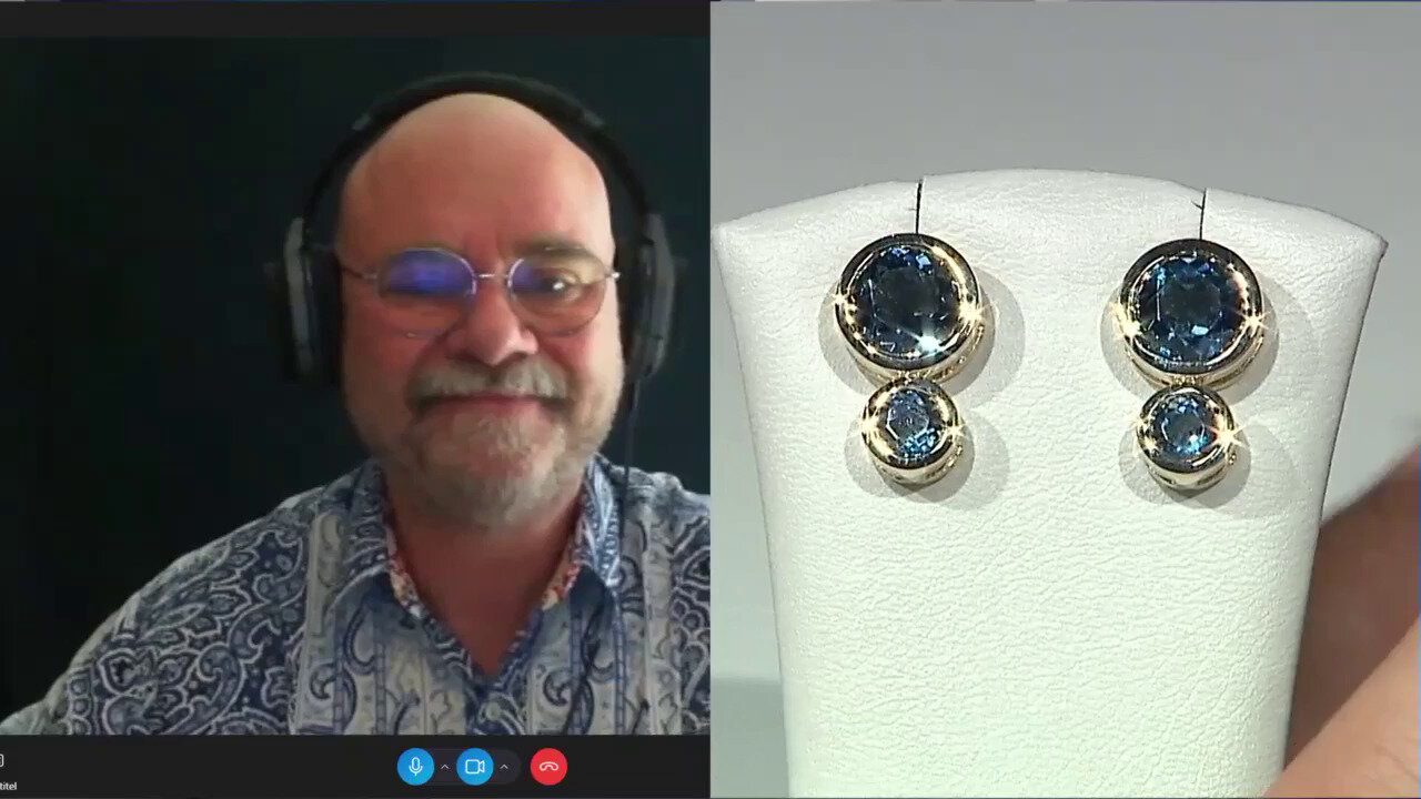 Video Gouden oorbellen met Londen-blauwe topaasstenen