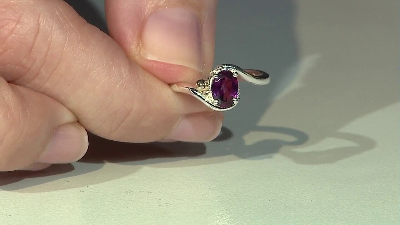 Video Zilveren ring met een rhodliet (Granulieren)