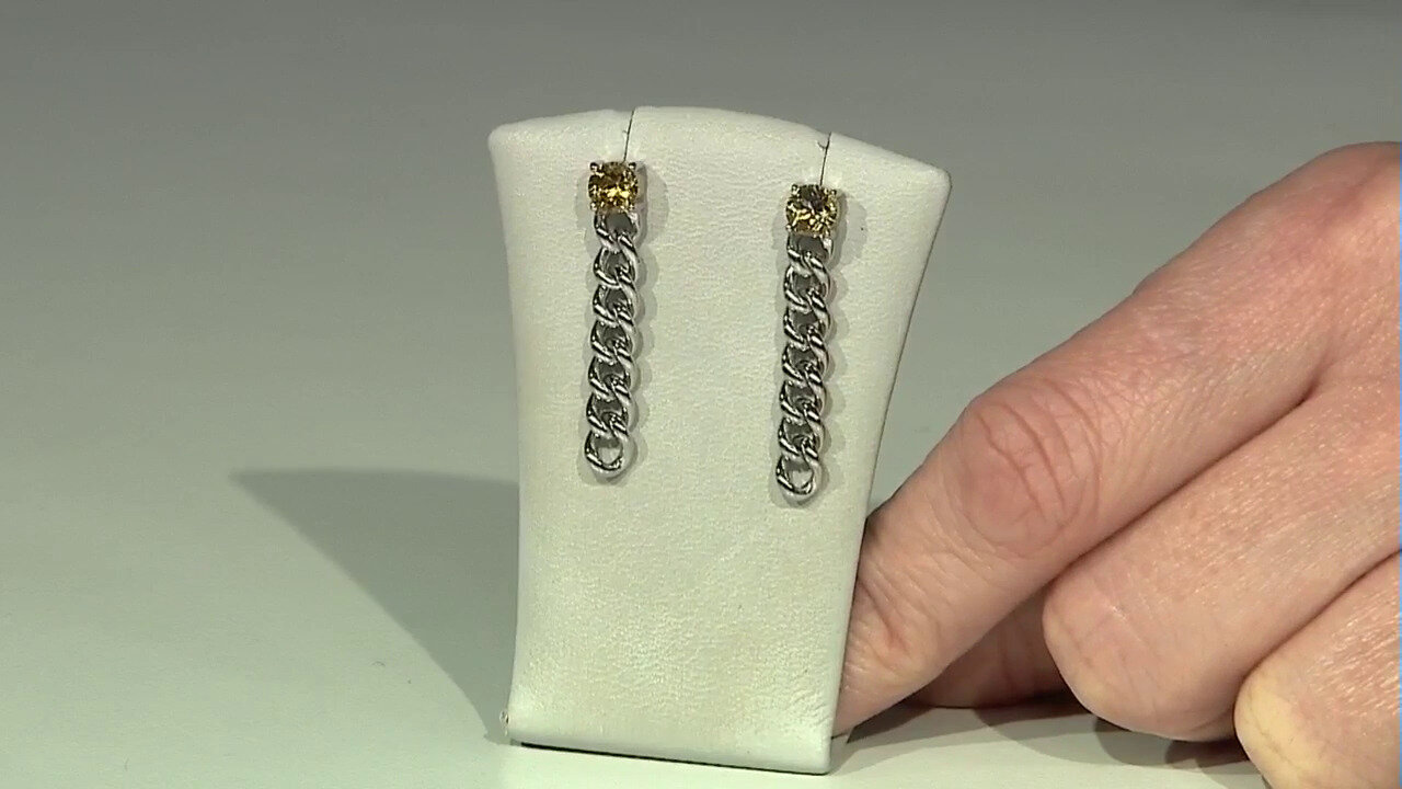Video Zilveren oorbellen met gele berillstenen