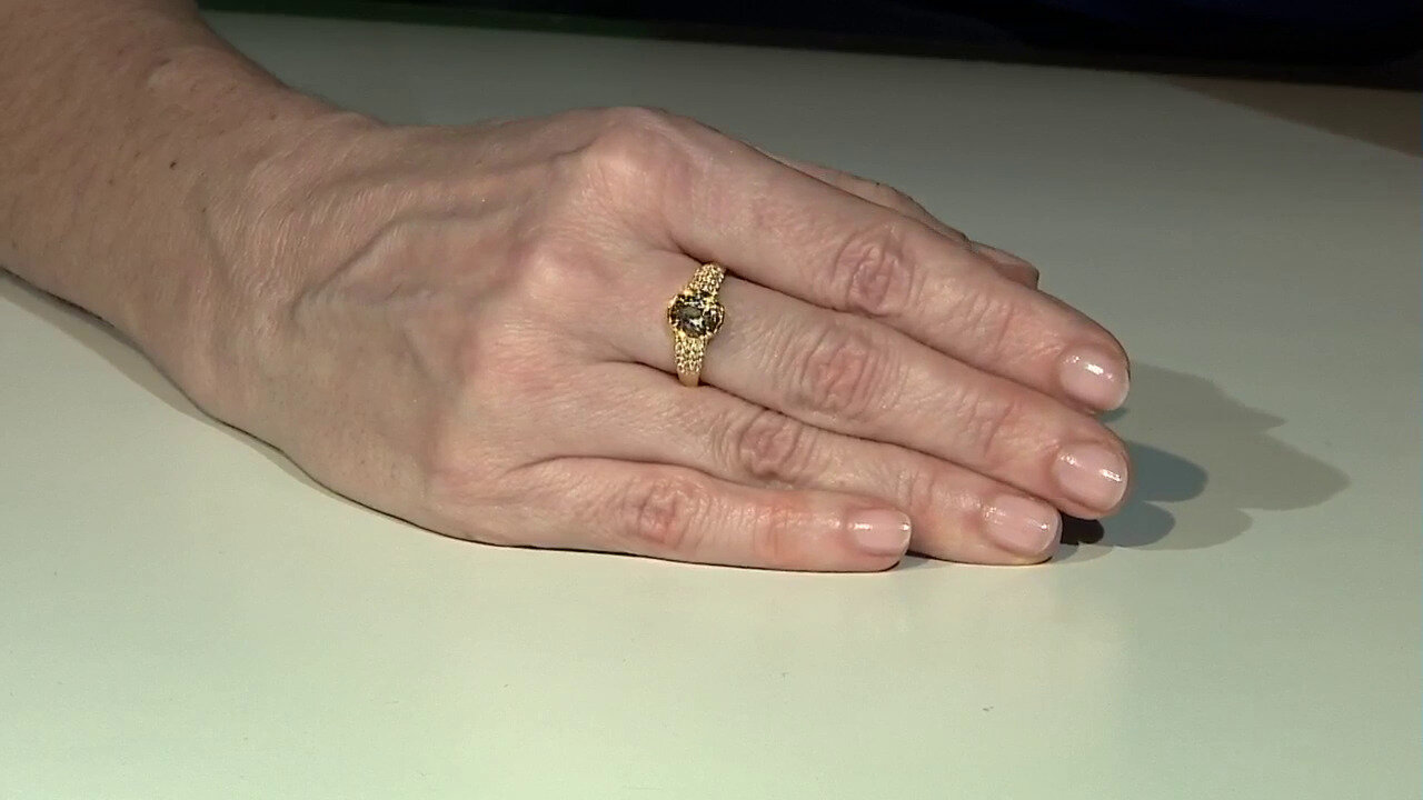 Video Zilveren ring met een gele tanzaniet