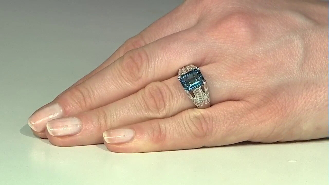 Video Zilveren ring met een Londen-blauwe topaas