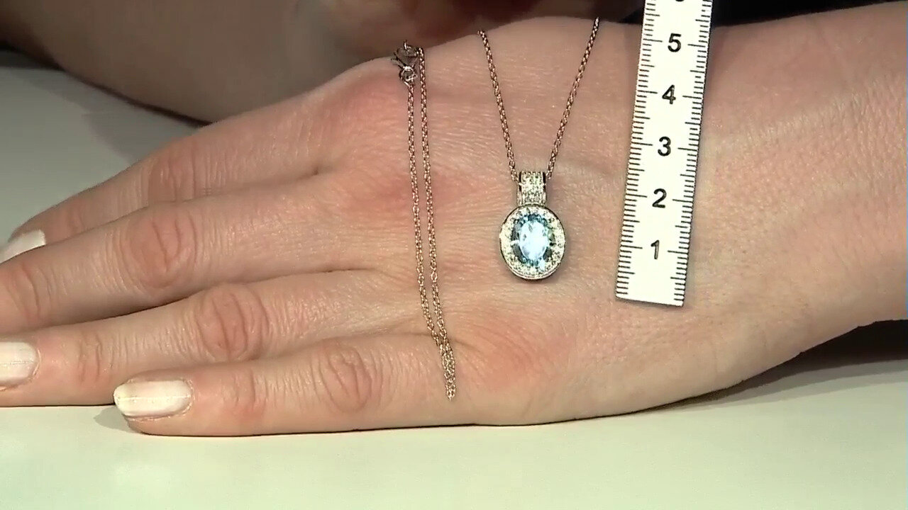 Video Zilveren halsketting met een hemel-blauwe topaas