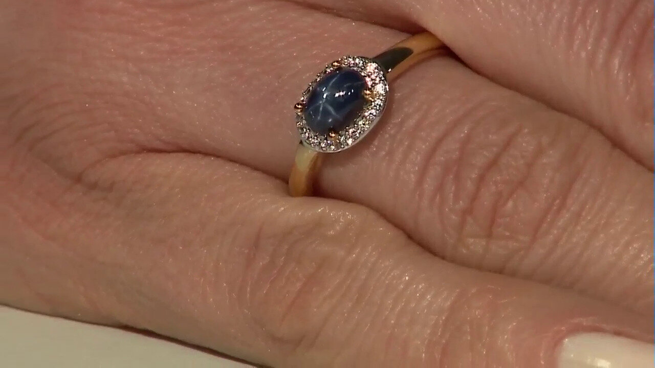 Video Zilveren ring met een blauwe ster saffier