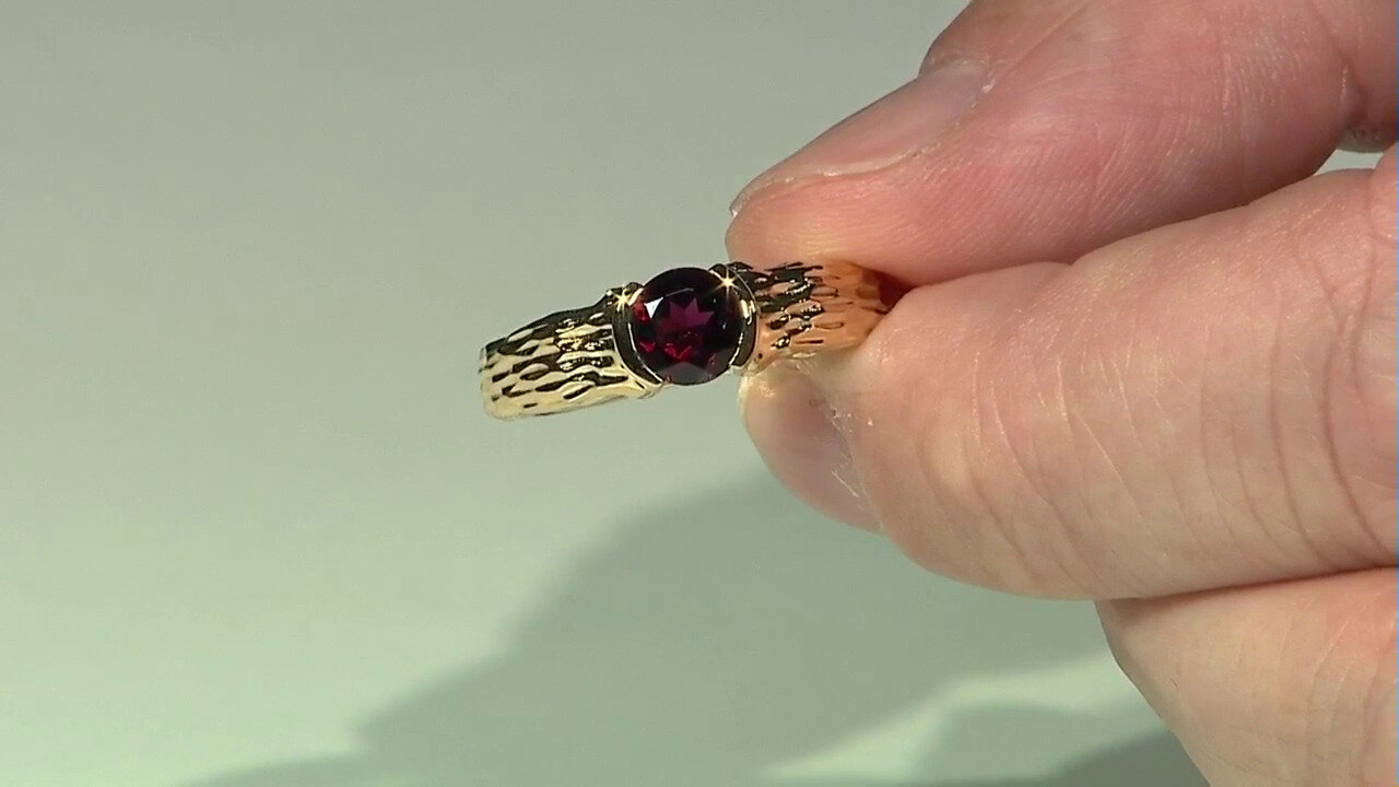 Video Zilveren ring met een framboos rhodoliet
