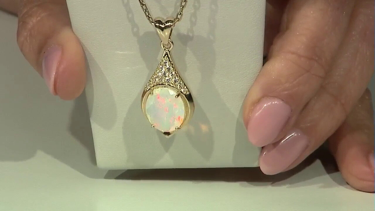 Video Gouden ring met een Welo-opaal (Adela Gold)