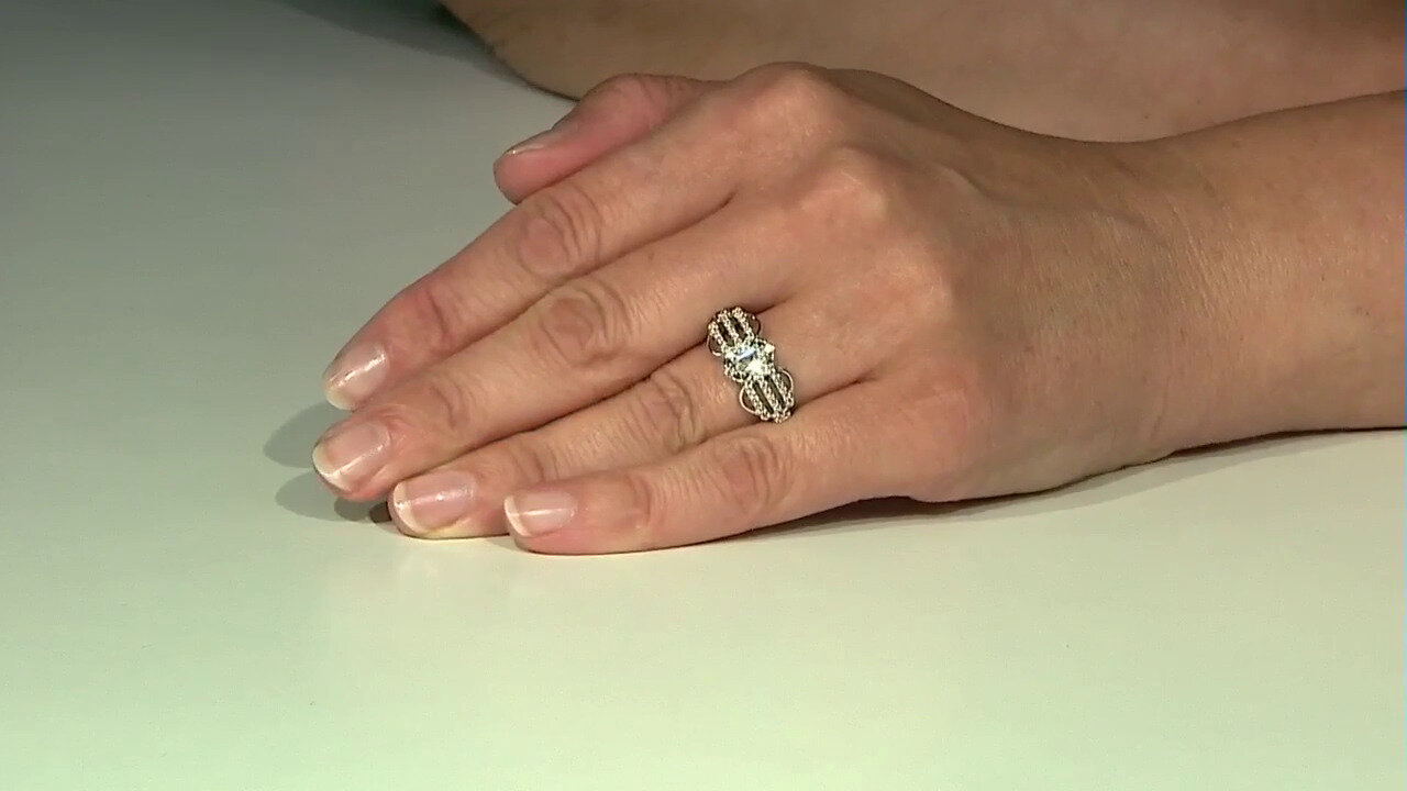 Video Zilveren ring met een witte saffier