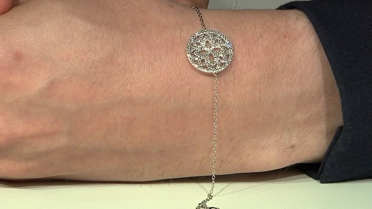 Video Zilveren armband met witte topaasstenen