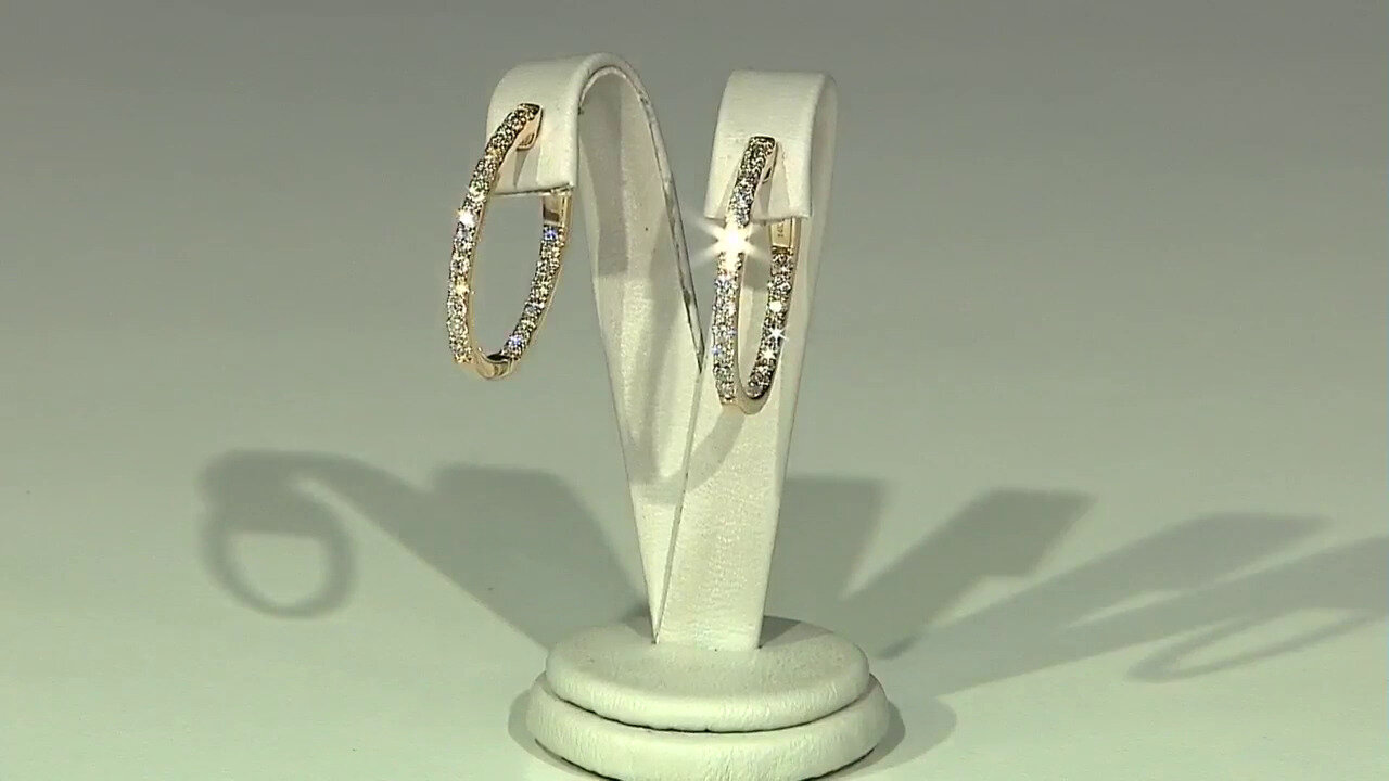 Video Gouden oorbellen met I1 (H) Diamanten (CIRARI)