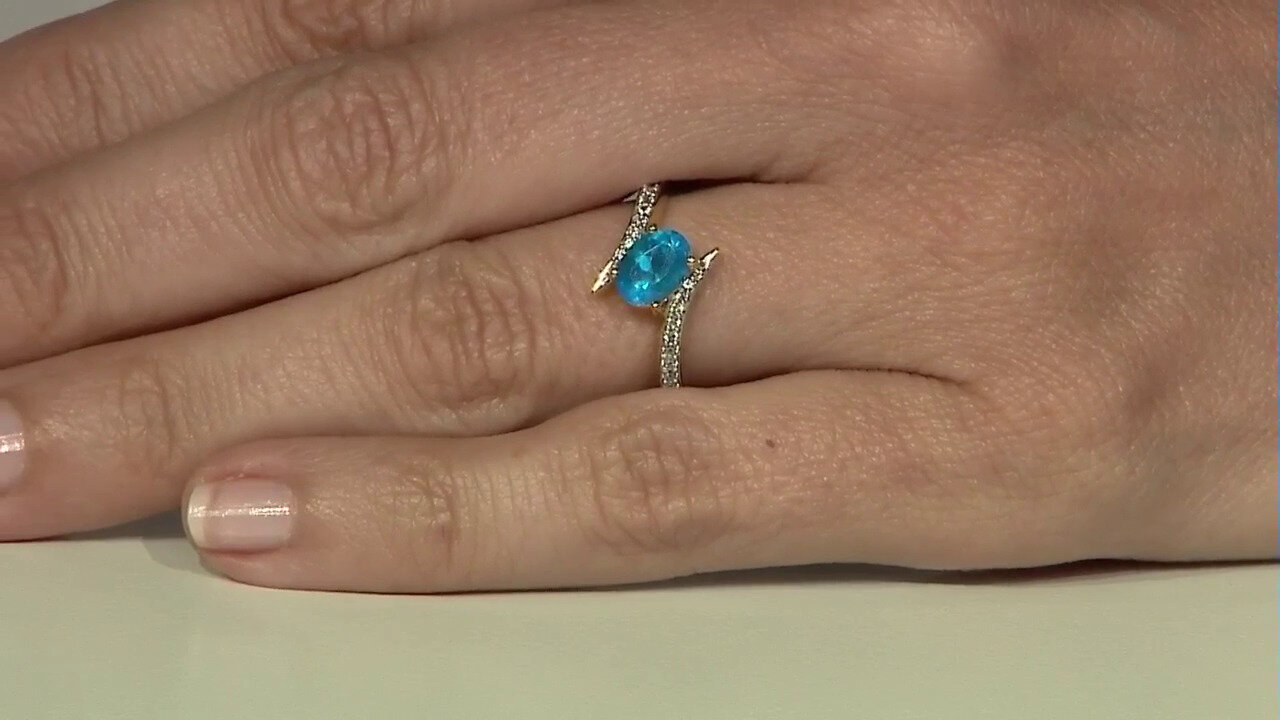 Video Zilveren ring met een neon blauwe apatiet