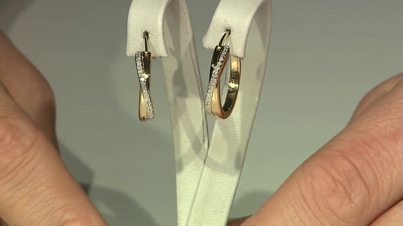 Video Zilveren oorbellen met I2 (J) Diamanten
