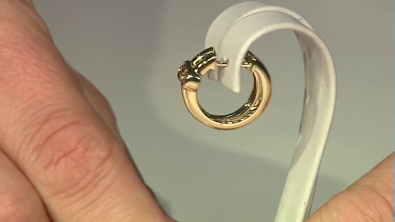 Video Gouden oorbellen met I1 Bruine Diamanten