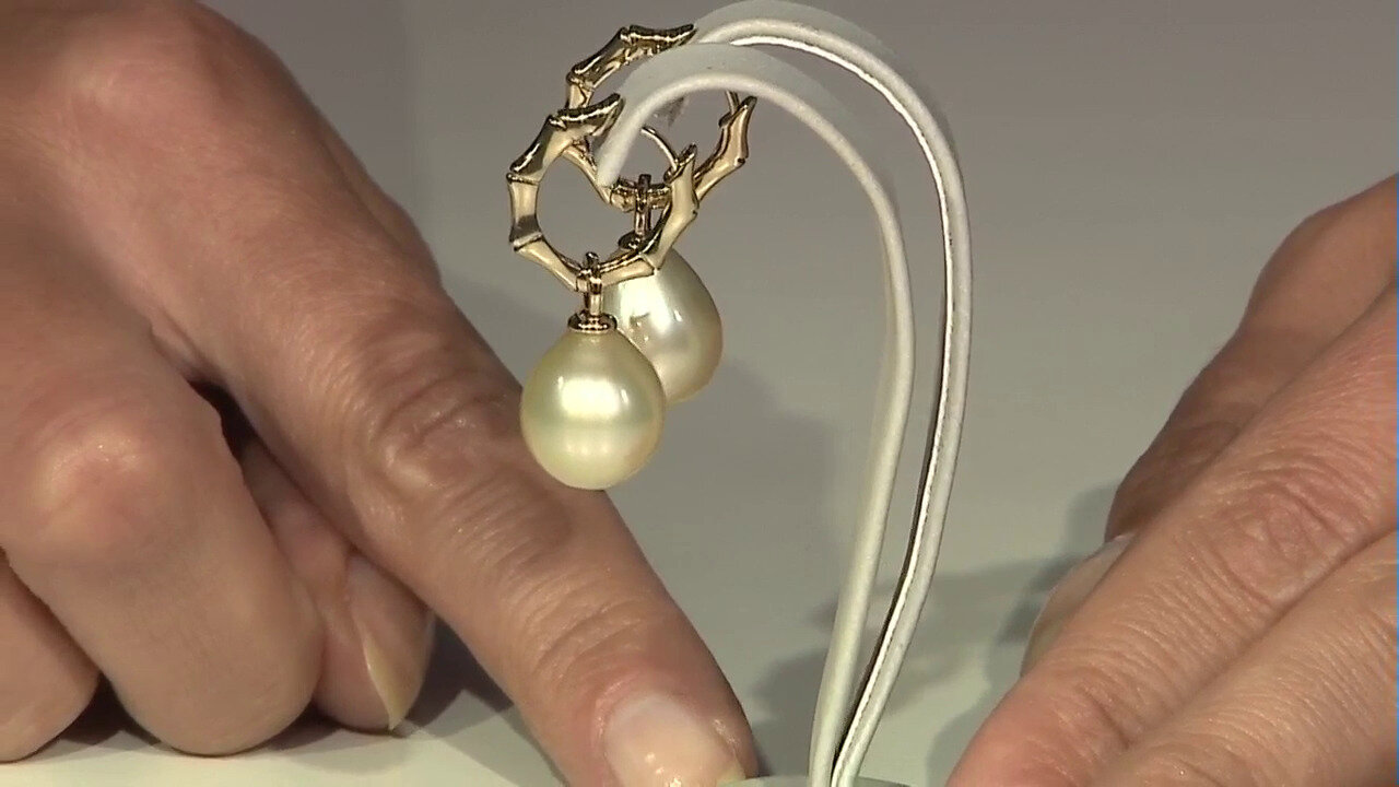 Video Boucles d'oreilles en argent et Perle de culture d'eau douce de couleur pêche (TPC)