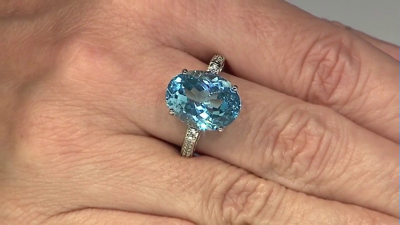 Video Zilveren ring met een hemel-blauwe topaas