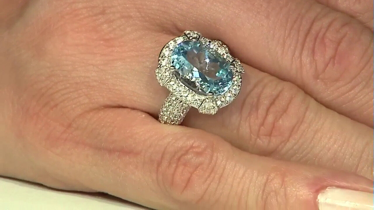 Video Zilveren ring met een hemel-blauwe topaas