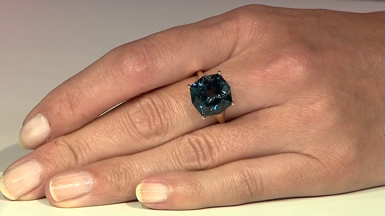 Video Gouden ring met een Londen-blauwe topaas