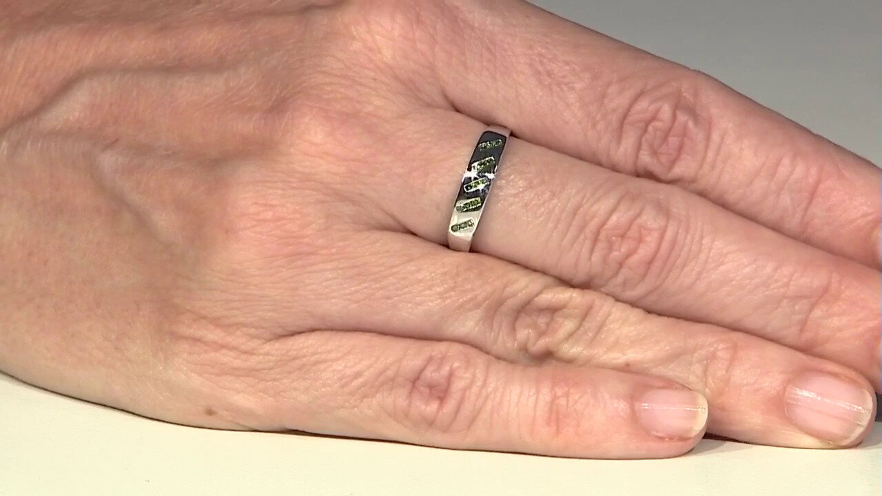 Video Zilveren ring met smaragdgroene diamanten